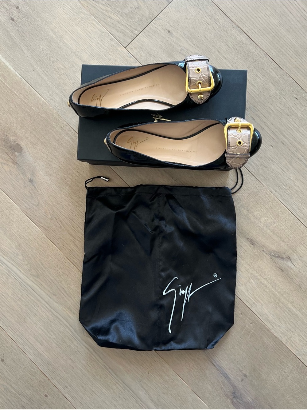 Giuseppe Zanotti Black Patent Leather Flats with Gold Buckle and Taupe Strap